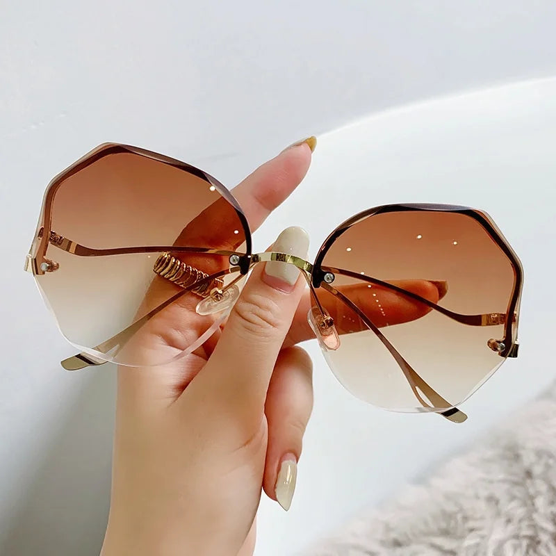 Ladies Frameless Curved Rim Sunglasses - various colours