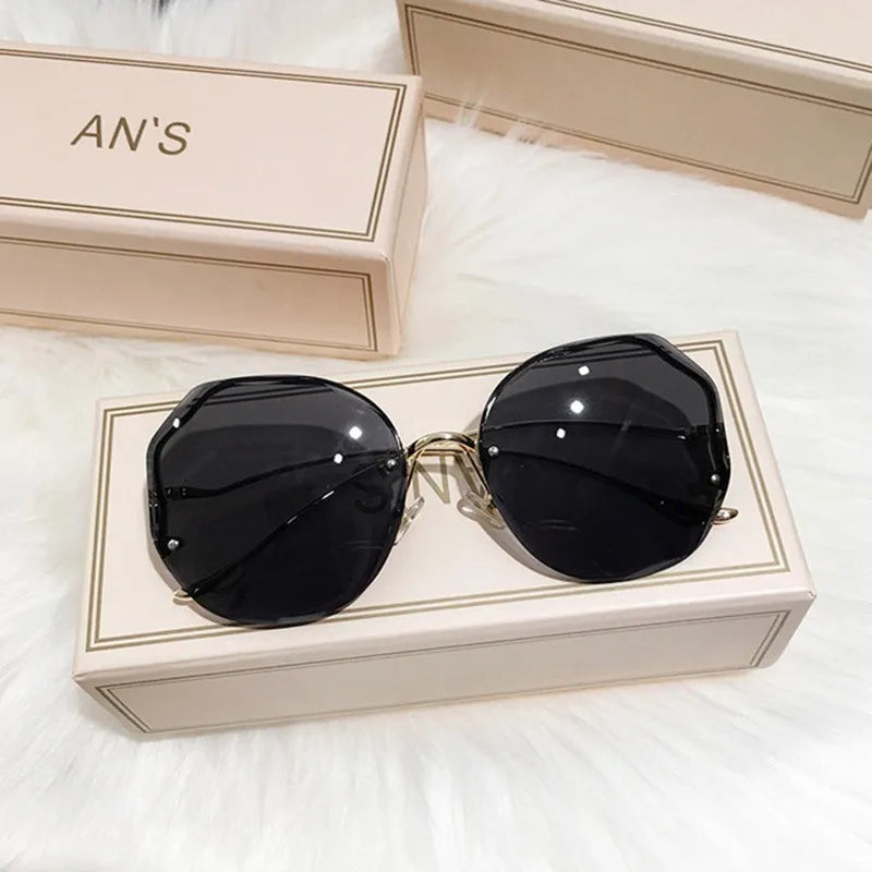 Ladies Frameless Curved Rim Sunglasses - various colours