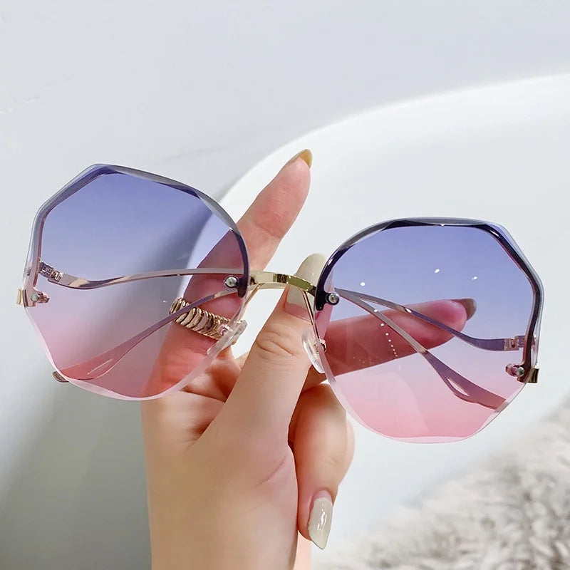 Ladies Frameless Curved Rim Sunglasses - various colours