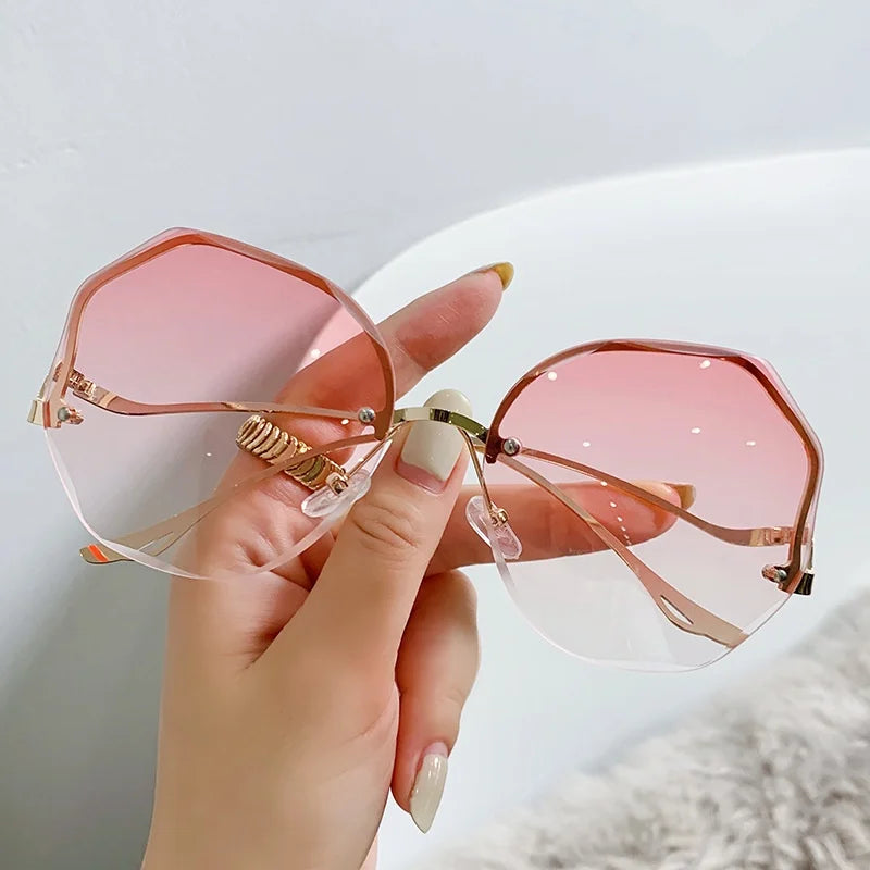 Ladies Frameless Curved Rim Sunglasses - various colours